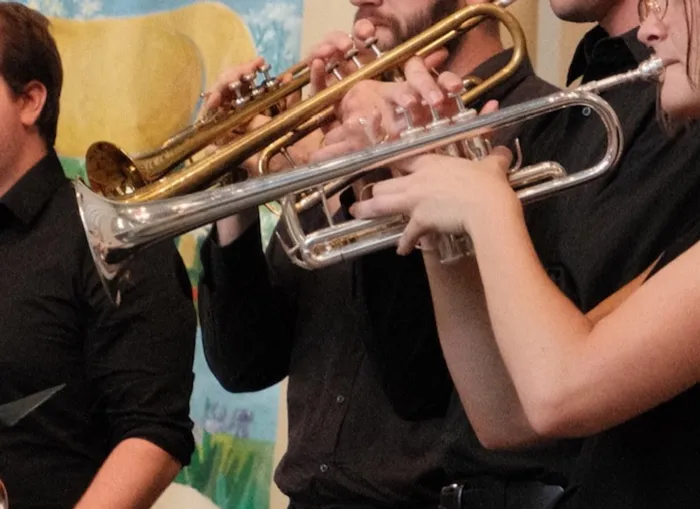 Production art for Brass Sextet Concert featuring works by Bach, Grieg, Shostakovich, and Beach
